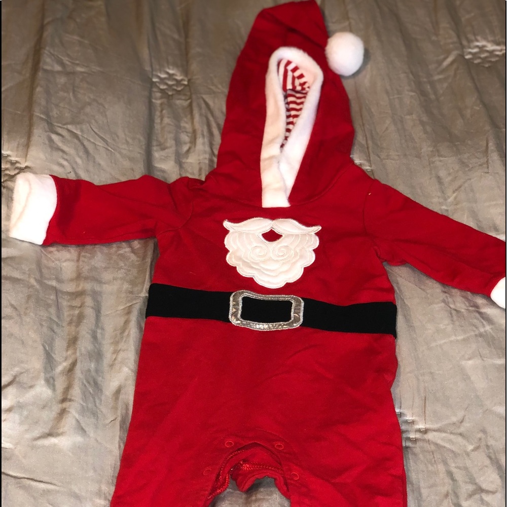 Baby’s Santa outfit .
